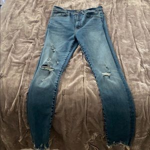 Ultra high rise distressed skinny jeans